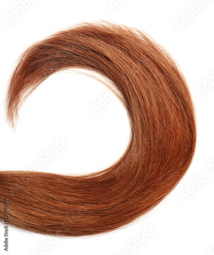 Lock of healthy brown hair on white background