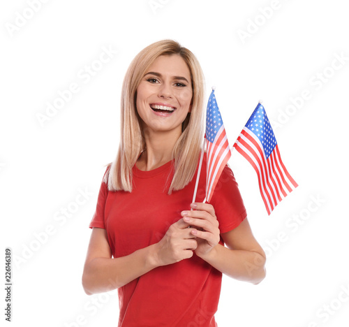 Portrait of woman with American flags on white background