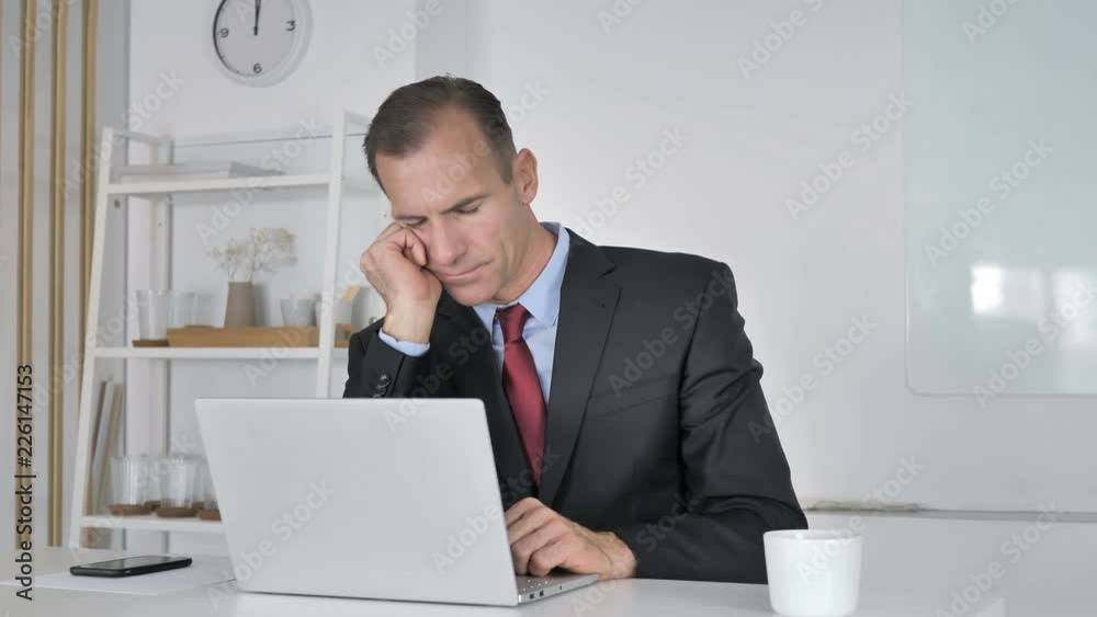 Tired Middle Aged Businessman Sleeping at Work Tired Middle Aged Businessman Sleeping at Work