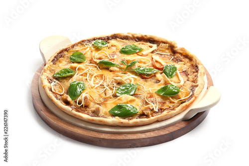 Wooden board with delicious homemade pizza on white background