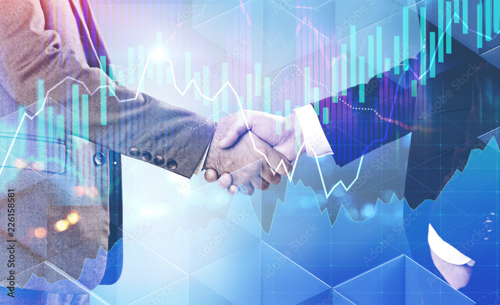 Handshake of businessmen, glowing graphs interface Handshake of businessmen, glowing graphs interface