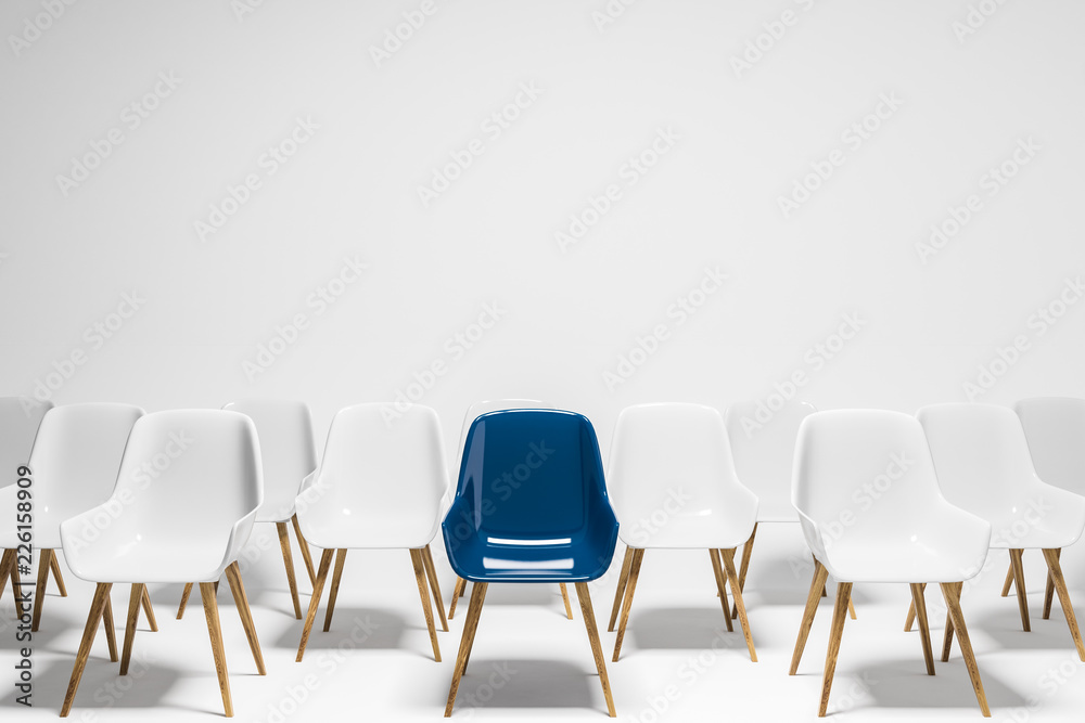 Blue chair among rows of white chairs, choice Blue chair among rows of white chairs, choice