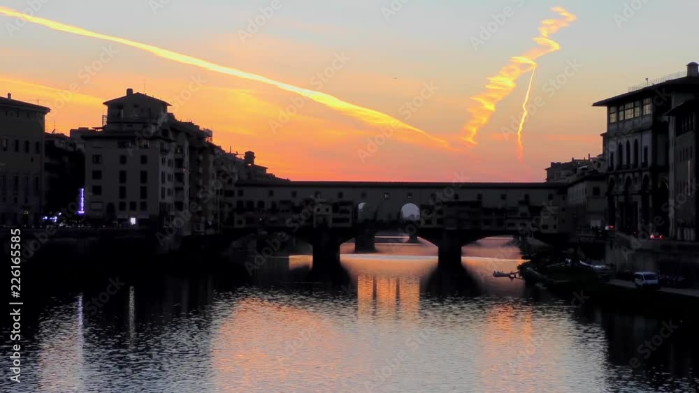 Ponte Vecchio bridge at sunset in Florence, Italy. The Ponte Vecchio ( Ponte Vecchio bridge at sunset in Florence, Italy. The Ponte Vecchio (