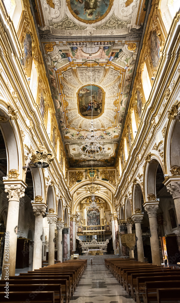 Internal of cathedral of Matera with faithful