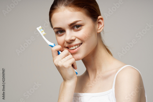 woman smile snow white teeth care toothbrush
