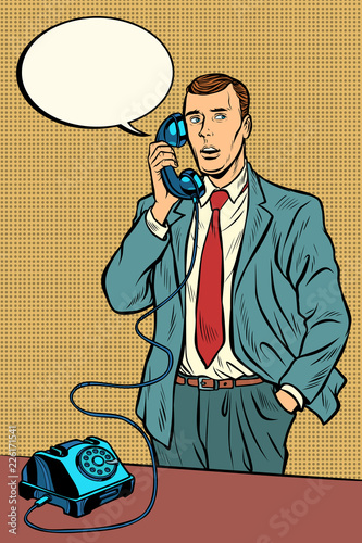 man talking on a retro phone