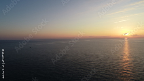 Ocean at sunrise aerial view