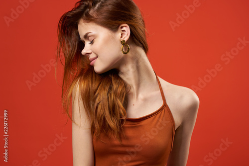beautiful woman on orange background