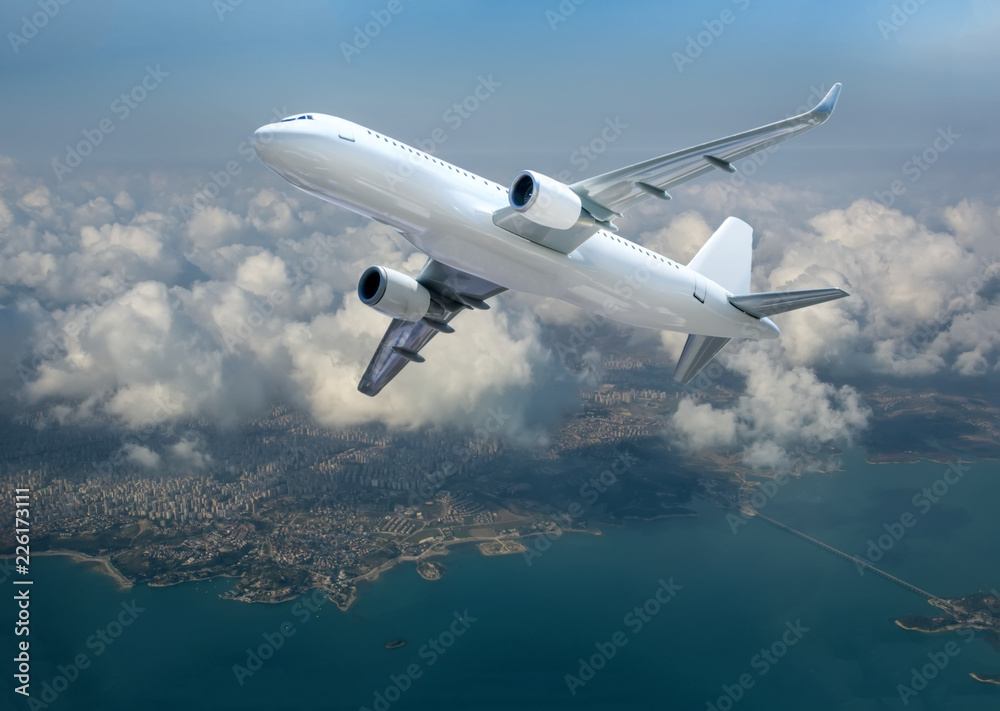 Passenger airplane in the clouds. passenger plane flying over the city Passenger airplane in the clouds. passenger plane flying over the city