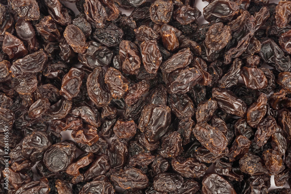 Organic dried raisins texture background, currant Organic dried raisins texture background, currant