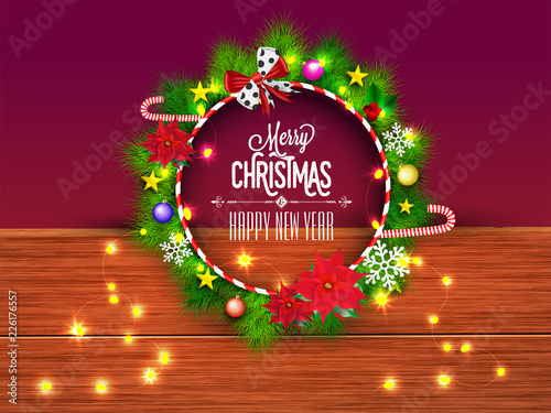 Christmas wreath decorated with festival elements on brown wooden texture background for festival celebration concept.