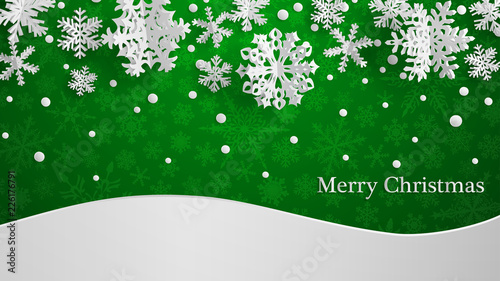 Christmas illustration with white three-dimensional paper snowflakes on green background with snowdrifts