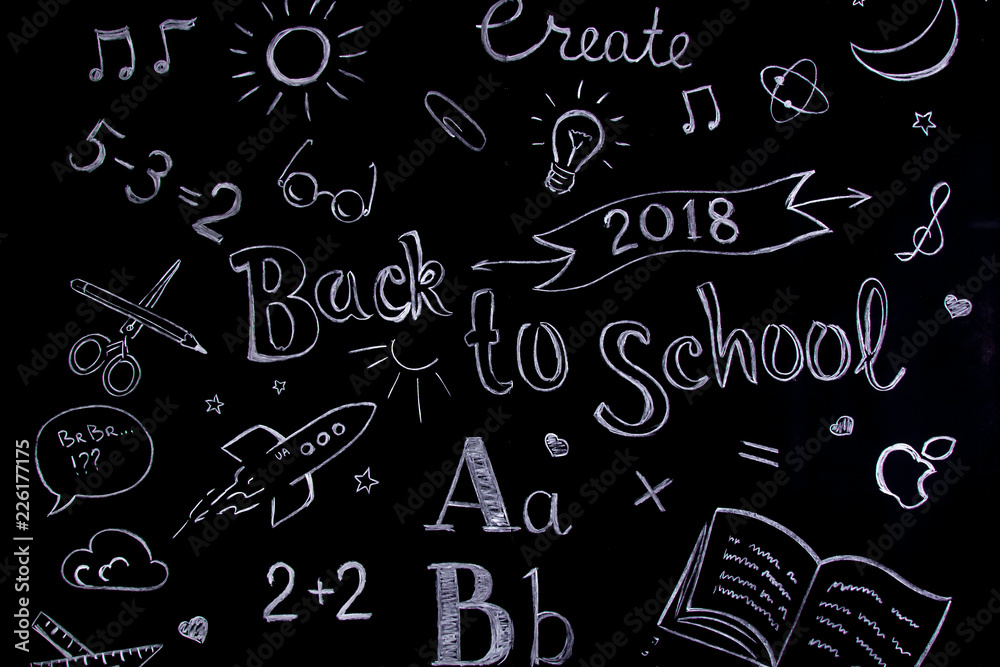 Handwritten school concept on blackboard written with chalk. Back to School Handwritten school concept on blackboard written with chalk. Back to School