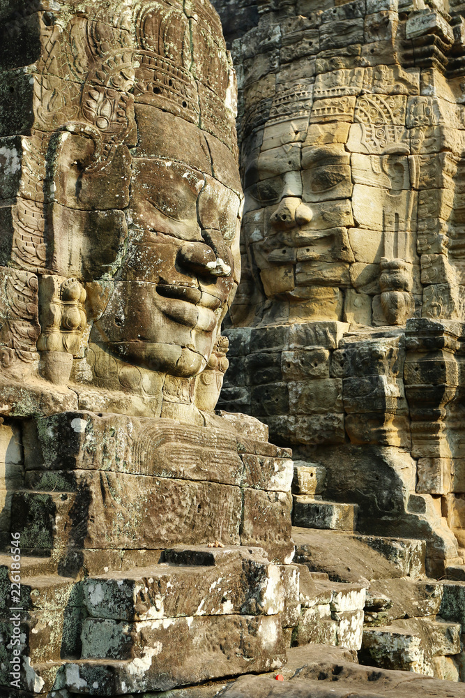 carved faces at Angkor wat temple, bayon,Cambodia carved faces at Angkor wat temple, bayon,Cambodia