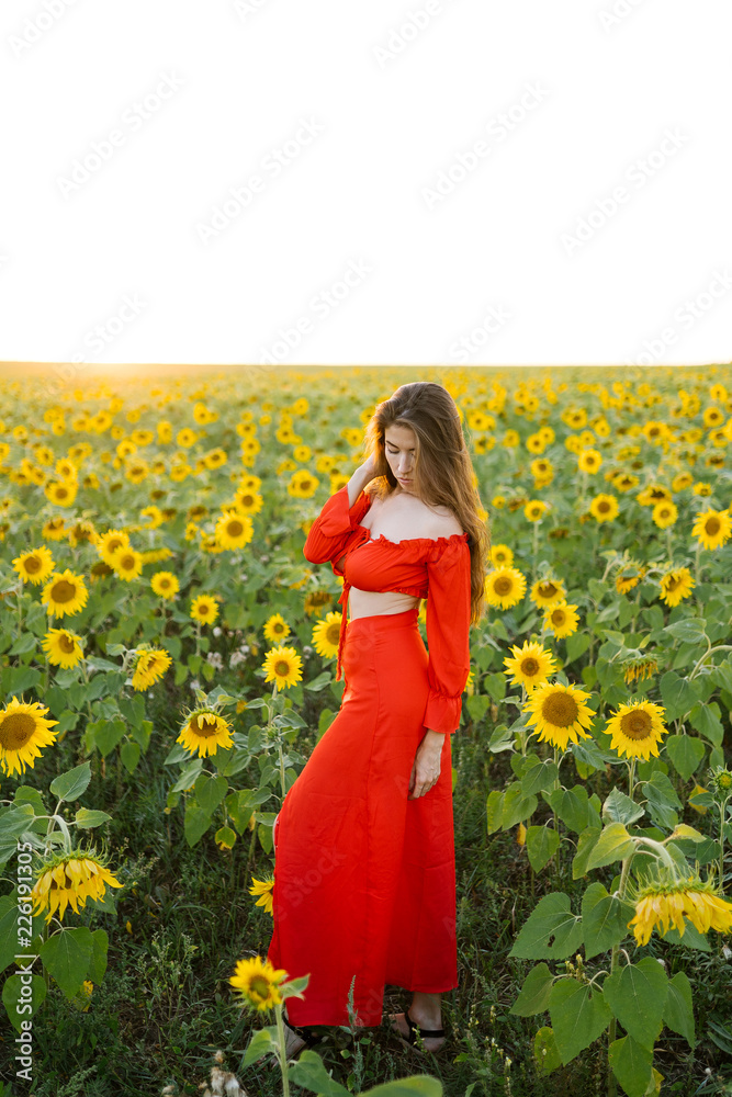 Beauty joyful girl in sunflower field Beauty joyful girl in sunflower field
