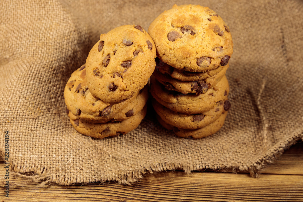 Chocolate chip cookies on wooden table Chocolate chip cookies on wooden table