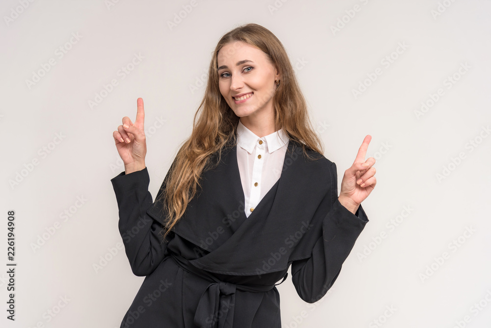 Portrait of a beautiful brunette girl on a white background with different emotions. Portrait of a beautiful brunette girl on a white background with different emotions.