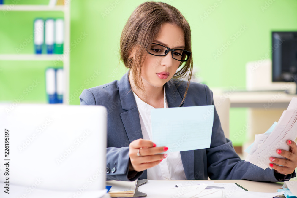 Female financial manager working in the office Female financial manager working in the office
