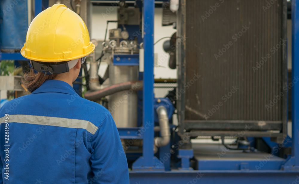 Engineer woman in industry factory checking production. Engineer woman in industry factory checking production.