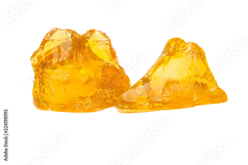 Yellow gum Rubber on a white background.