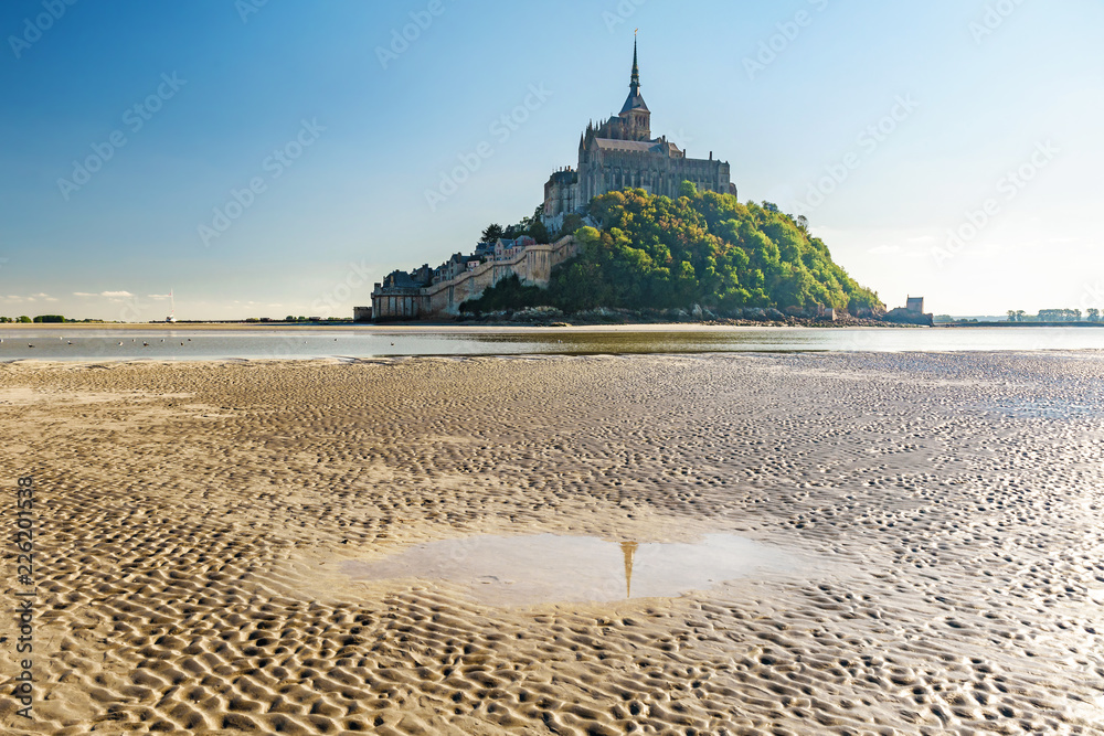 Mont Saint Michel abbey on the island in low tide, Normandy, Northern France, Europe