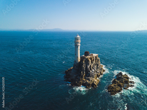 Fastnet lighthouse at summer photo