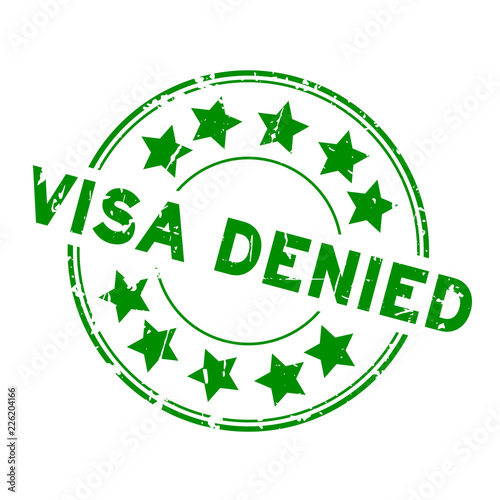 Grunge green visa denied with star icon round rubber seal stamp on white background