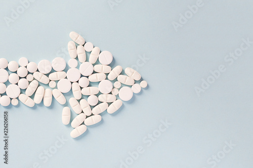 arrow of pills, health concept, direction to recovery