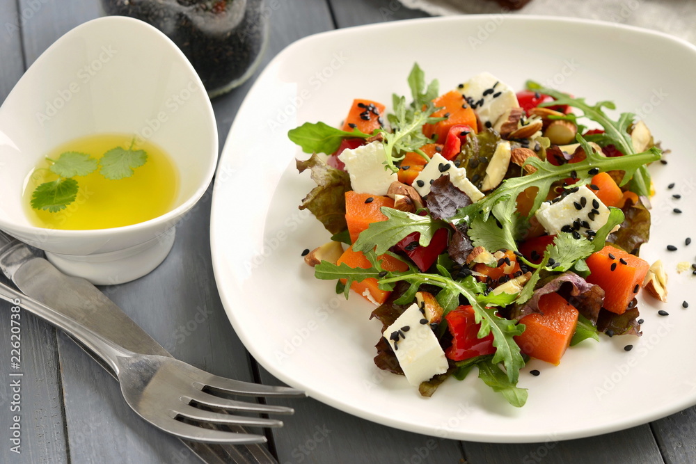 Pumpkin salad with feta, sweet pepper, fresh herbs, almonds and sesame Pumpkin salad with feta, sweet pepper, fresh herbs, almonds and sesame