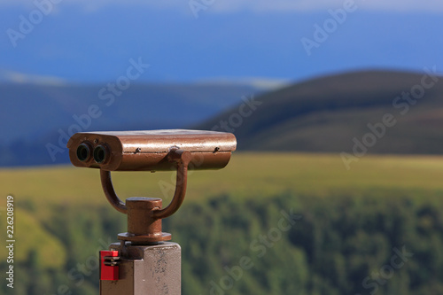 Binoculars on a viewing platform for observing flora, fauna and landscape.