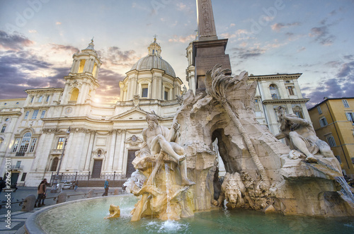 Fountain of the Four Rivers ( Fontana dei Quattro Fiumi ) in Piazza Navona. top sightseeing in The Eternal City, Rome, Italy. Top place for tourist visit. Landmark at sunset
