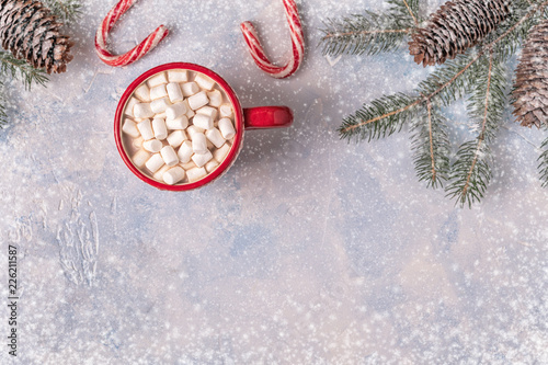 Christmas background with hot cocoa and marshmallow.