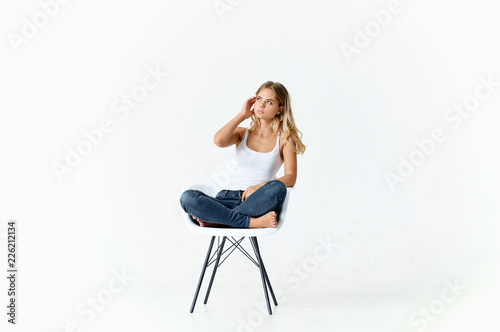 home woman sitting on a chair