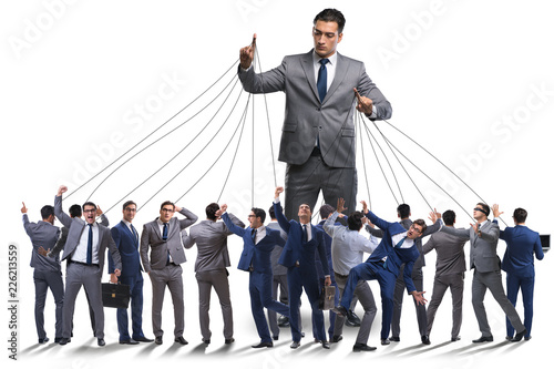 Bild auf Leinwand Boss employee manipulating his staff in business concept