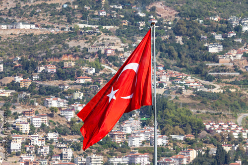 Schilderij op canvas Turkish flag in front of the city of Antalya