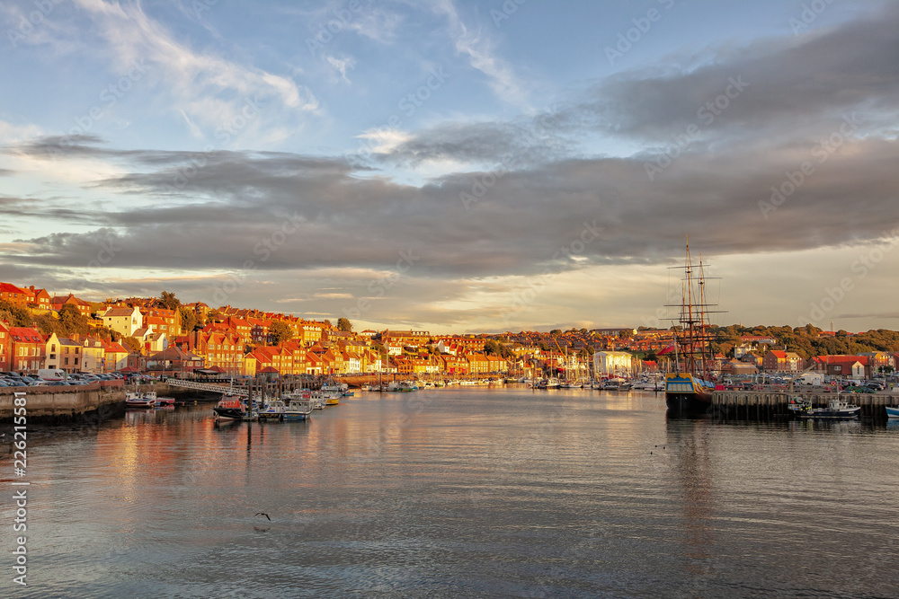 view of Whitby Harbour at sunset