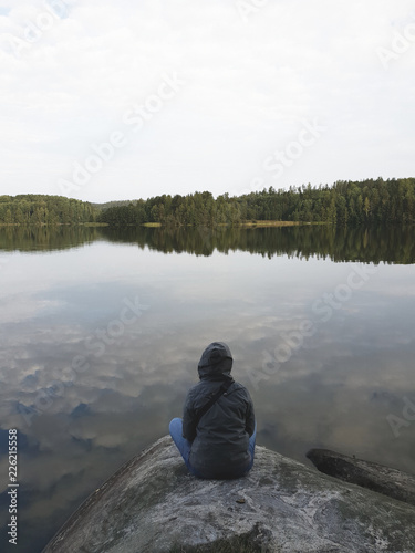 young man on the lake