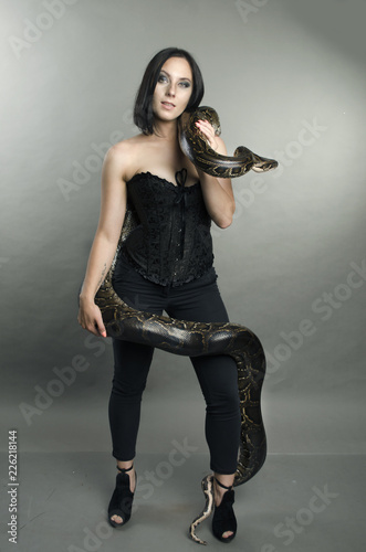 beautiful sensual woman and python photo