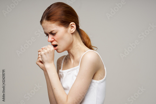 woman is sick coughing flu