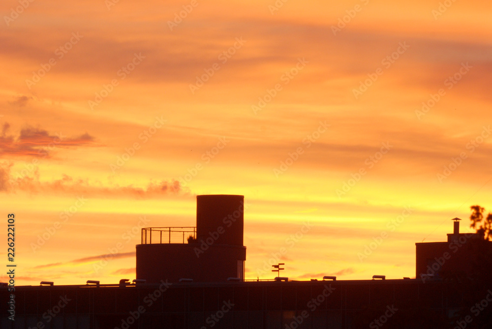 silhouette of city at sunset