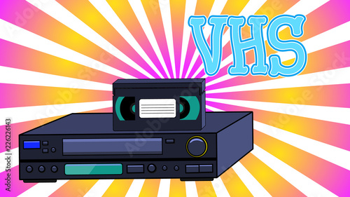 Old retro wines antique analog hipster video recorder with magnetic video tape for watching movies and the inscription VHS on the background of abstract rays
