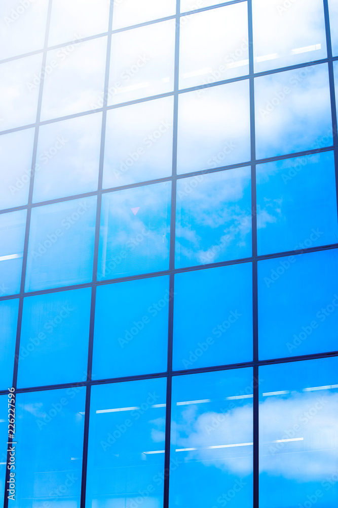 low angle view to glass window of modern skyscraper. business concept of success industry in architecture low angle view to glass window of modern skyscraper. business concept of success industry in architecture