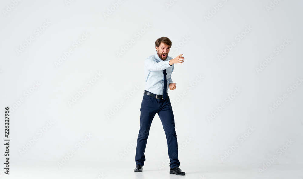 business man with a beard with emotions on his face business man with a beard with emotions on his face