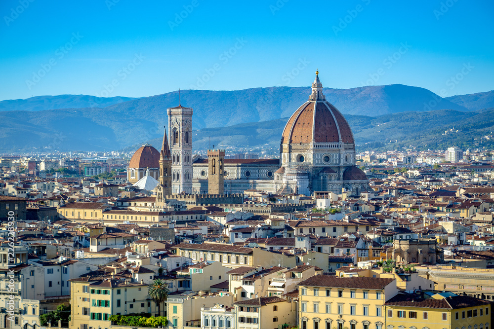 Panoramic view of the old town of Florence, Italy during the sunset with the view of famous Santa Maria del Fiore Cathedral.