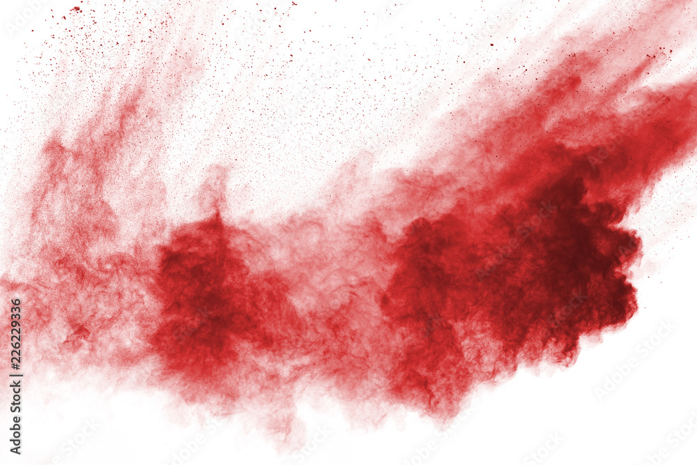 Freeze motion of red powder exploding, isolated on white background. Abstract design of red dust cloud. Particles explosion screen saver, wallpaper Freeze motion of red powder exploding, isolated on white background. Abstract design of red dust cloud. Particles explosion screen saver, wallpaper