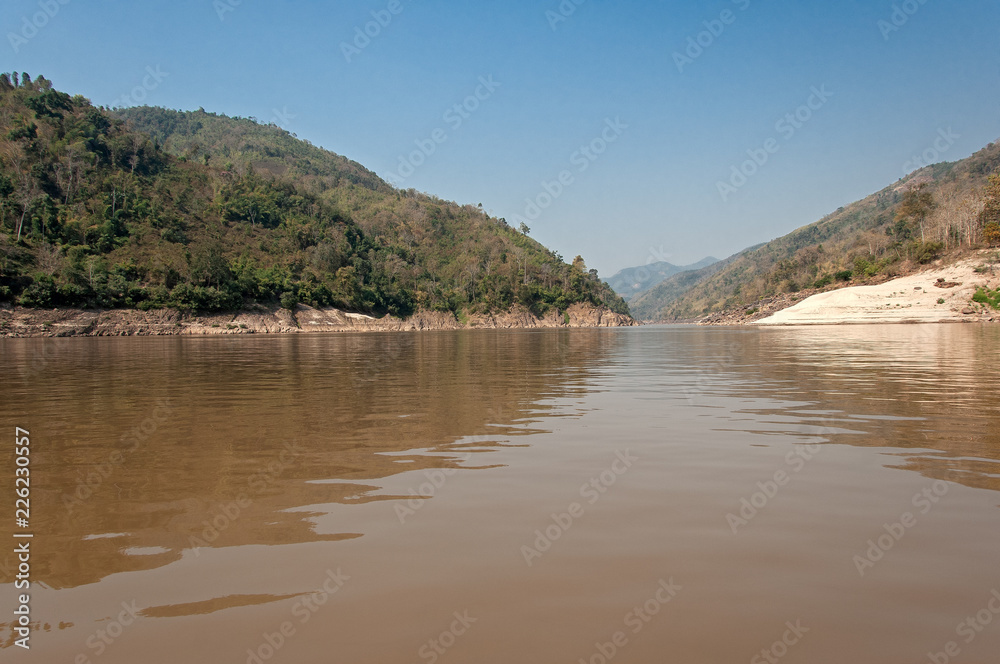 Sailing on the Mekong River in Laos Sailing on the Mekong River in Laos