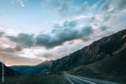 Mountain road in Altai. Sunset in Altay mountains