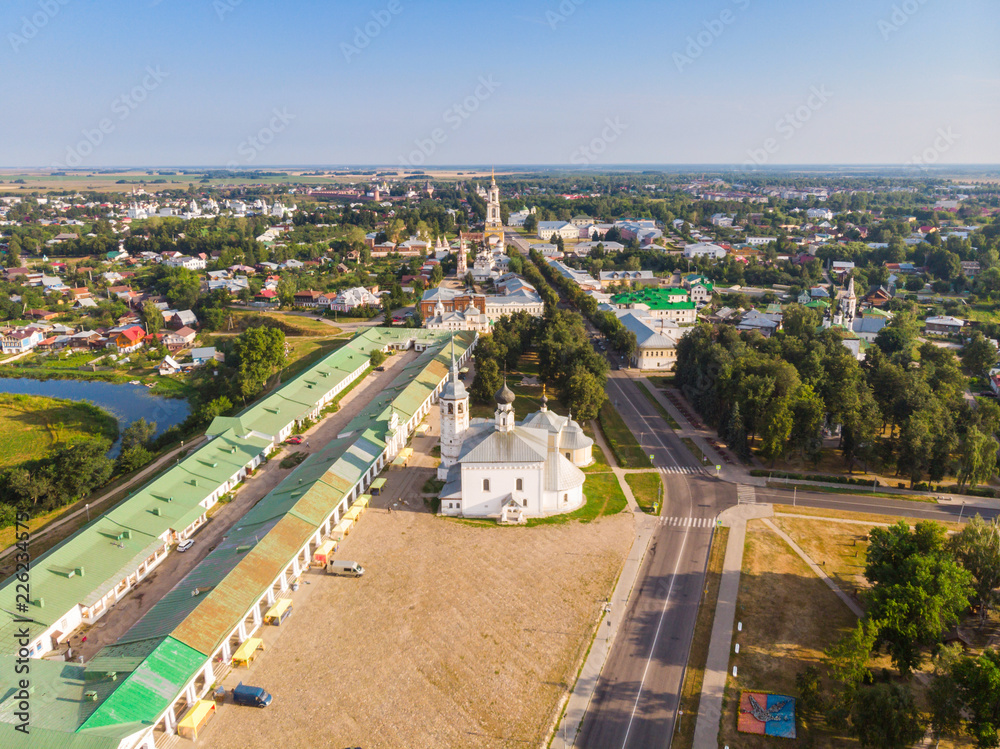 Beautiful panoramic view of Suzdal in summer at sunrise. Resurrection Church on the market square in Suzdal. Suzdal is a famous tourist attraction and part of the Golden Ring of Russia