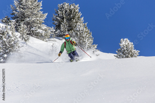 Offpiste skiing in deep powder snow