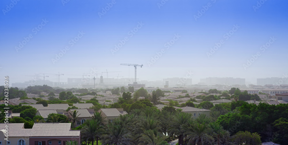 hot day for construction cranes in Dubai city, UAE